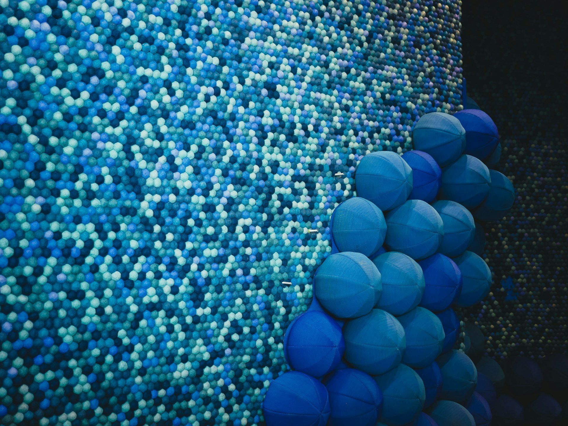 blue round ornament on blue and white textile